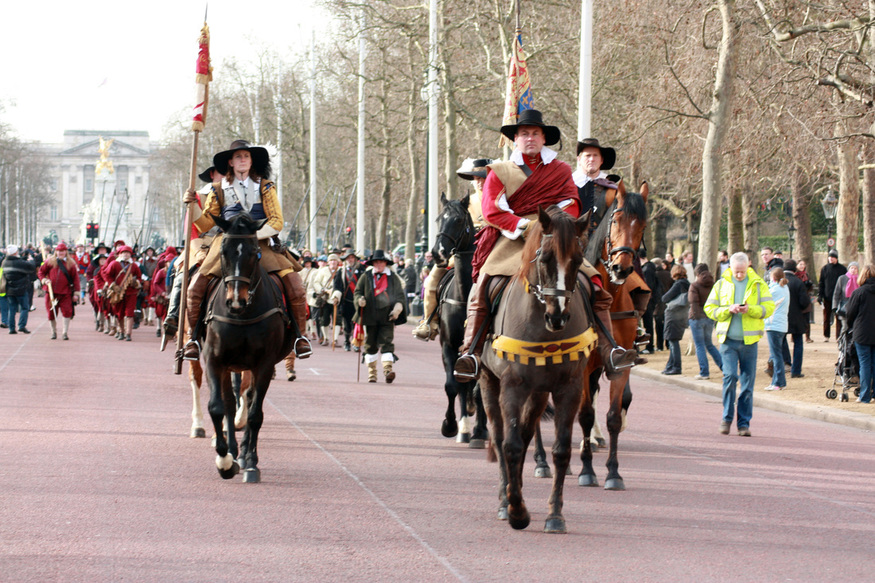 the King's Army parade down the Mall in funeral costume
