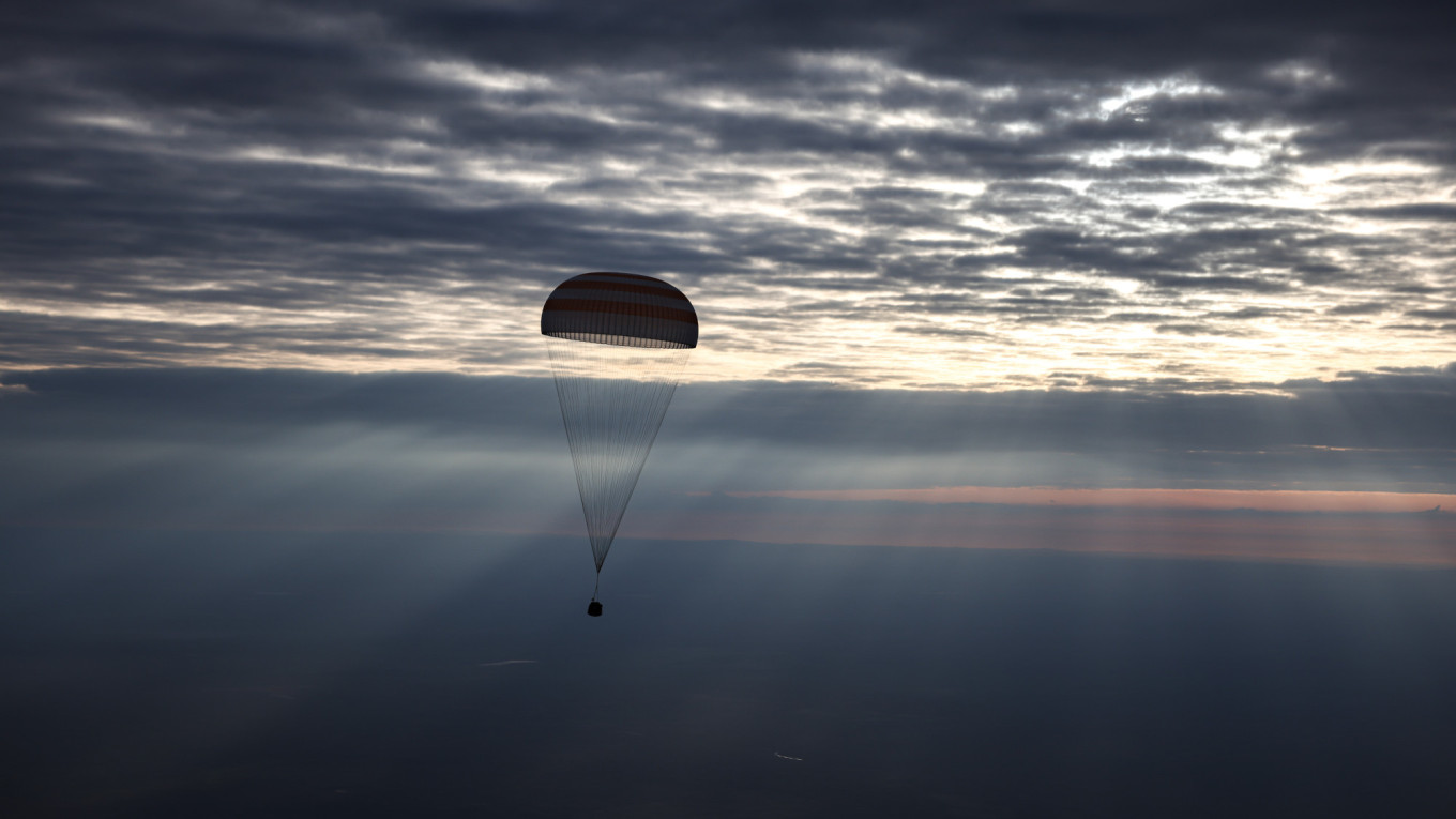Successful Soyuz Mission Returns American and Russian Astronauts After 220 Days in Space
