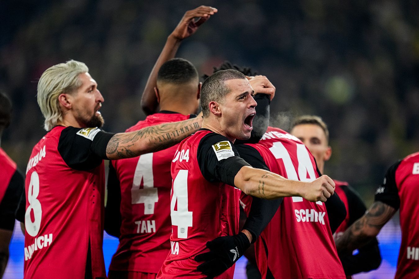 Bayer Stuns Augsburg to Delay Bayerns Title Celebration