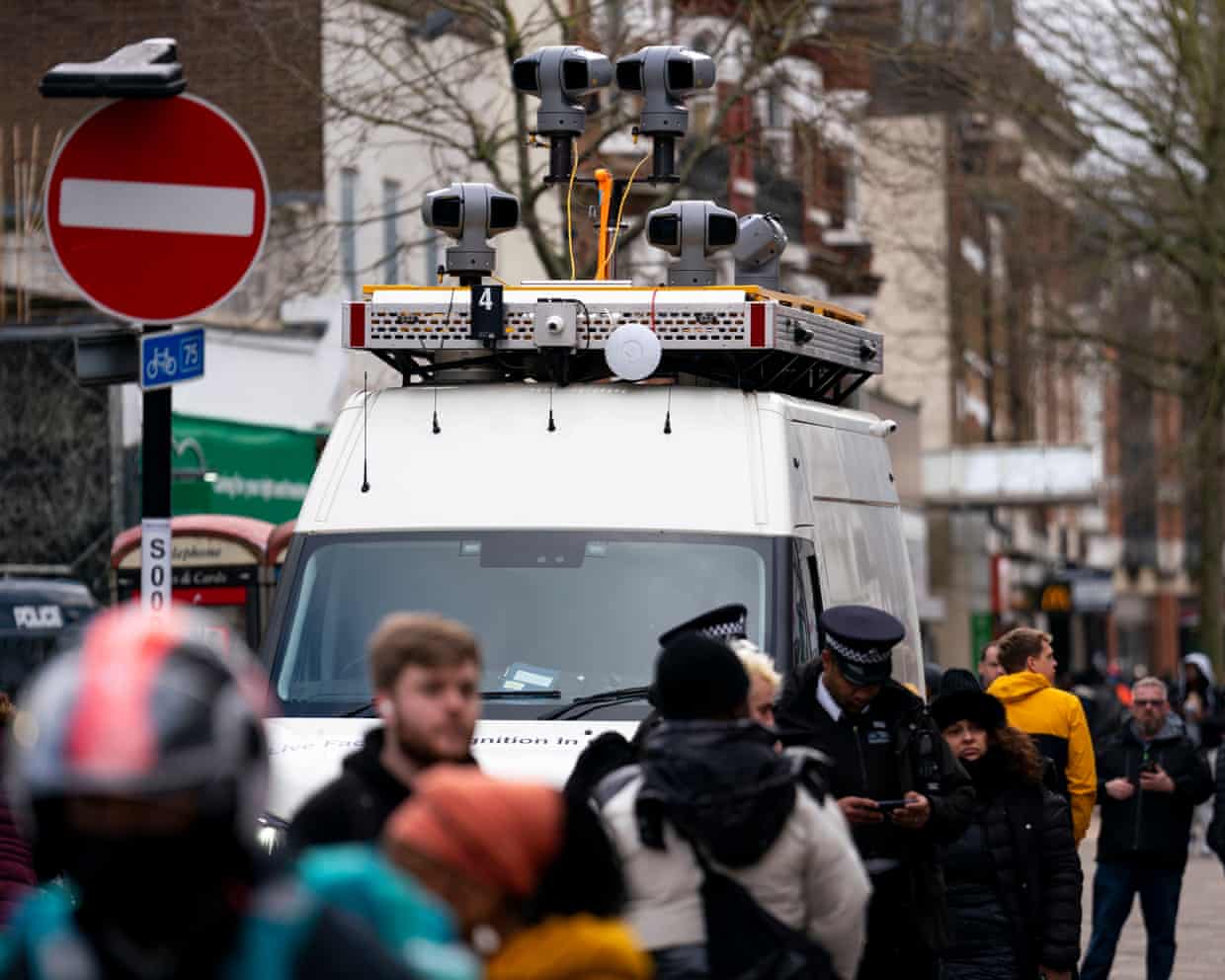 Headline: Surveillance Dilemma: Facial Recognition Cameras Spark Debate Over Safety and Privacy in Urban Policing