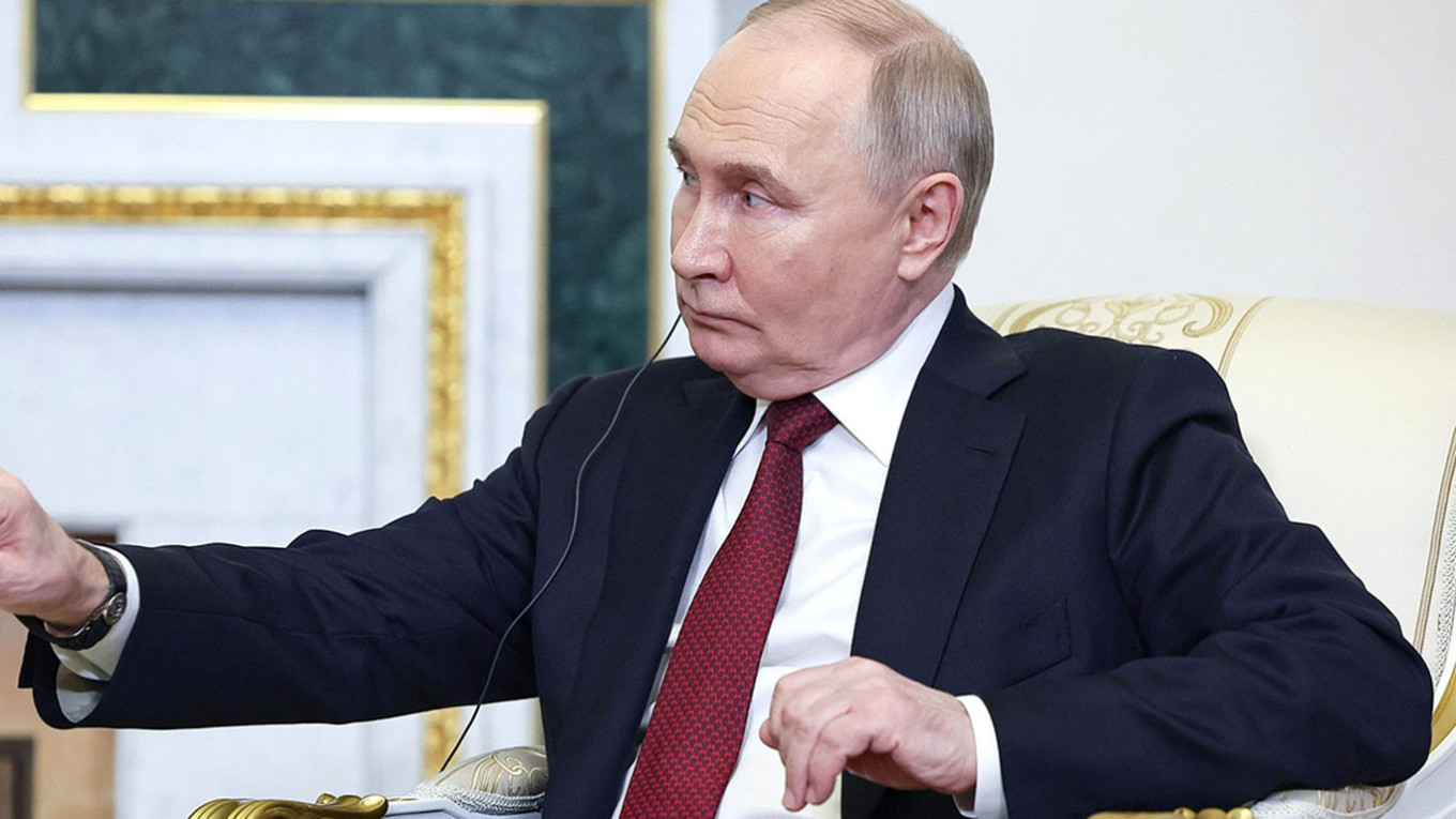 Putin and Irans Larijani Hold Unexpected Talks on Nuclear Program in Moscow