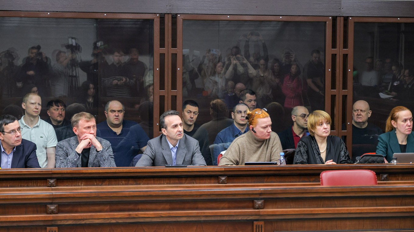 Military Court Sentences 8 to Life in Prison Over Crimean Bridge Bombing

Текст: A Russian military court on Thursday sentenced eight men to life in prison over the 2022 bombing of the Crimean Bridge, a key symbol of Russia’s claim to the peninsula it annexed in 2014.

The Oct. 8, 2022, blast killed five people and badly damaged a section of the bridge. Russian authorities said explosives had been hidden inside rolls of plastic film that were shipped from Odesa through Bulgaria, Armenia and Georgia using falsified paperwork.

Moscow accused Ukrainian security services of orchestrating the attack, alleging that a Ukrainian agent coordinated the movement of the explosives. Kyivtook responsibilityfor the bombing nearly a year later, while insisting that those arrested in Russia had been unaware that they were transporting explosives.

Russia’s Southern District Military Court in Rostov-on-DonsaidThursday that the defendants were found guilty of carrying out a deadly “terrorist act” and of illegally acquiring weapons as part of an organized criminal group. Two were also convicted of smuggling explosives.

All eight defendants had denied the charges against them. The trial began earlier this year and was held behind closed doors.

After the sentencing on Thursday, Oleg Antipov, a transportation company CEO and one of the defendants,insistedthe entire group was innocent and said they had cooperated fully with law enforcement officials during the investigation into the bridge bombing.

“Not a single person testified against us. Every witness says we’re innocent. All the evidence says we’re innocent. All 116 volumes [of the case] say we’re innocent. Show people the truth,” Antipov said in a video published by the independent news outlet Mediazona.

The Memorial human rights groupdesignatedall eight men as political prisoners, arguing that their cooperation with investigators indicates they had no links to Ukrainian intelligence services.

“All of them insist they were simply doing their regular work and had no knowledge that explosives were hidden in the cargo,” Memorial said in a statement.

The Crimean Bridge, completed in 2018, stretches 19 kilometers (12 miles) across the Kerch Strait and has served as a crucial logistics route for Russian forces amid the full-scale invasion of Ukraine. Ukraine has repeatedly targeted the bridge since February 2022.