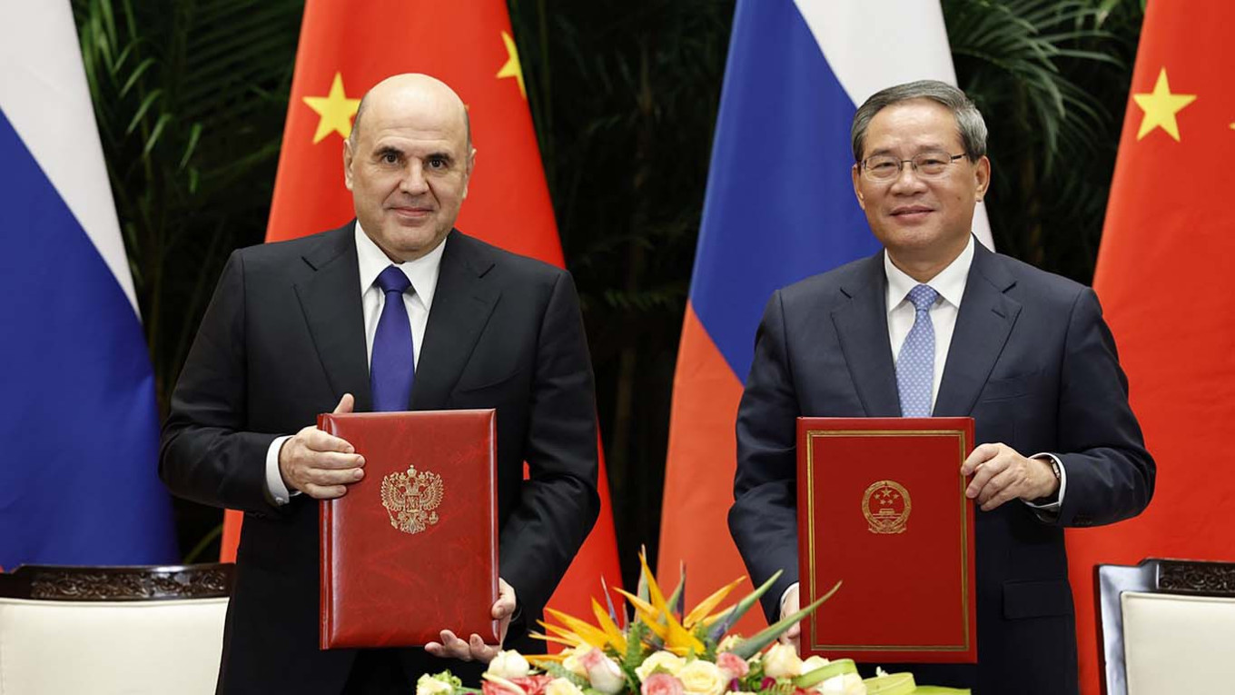 Strengthening Ties: Russian PM Engages with China’s Leadership Amid Trade Challenges