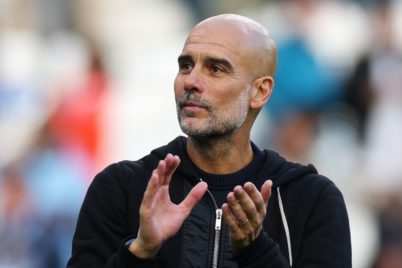 Guardiola Assesses Premier League Title Contenders: City in Close Pursuit of Arsenal